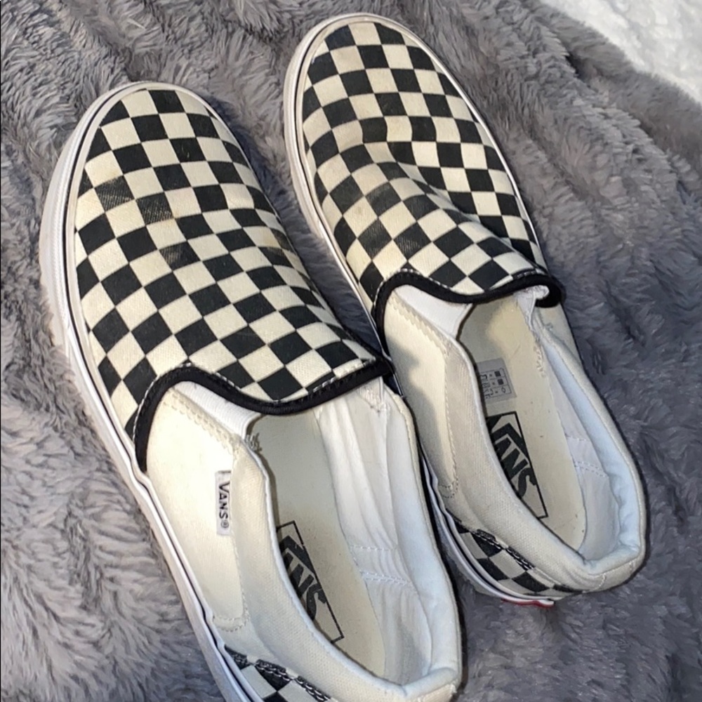 Black and white checkered slip on vans